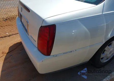 2003 Cadillac Deville Standard z USA, uszkodzony, nr VIN 1G6KD54Y73U173380